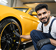 BF Automotive mechanic installing a tire in Calgary SE — exhaust, tires, and full auto repair